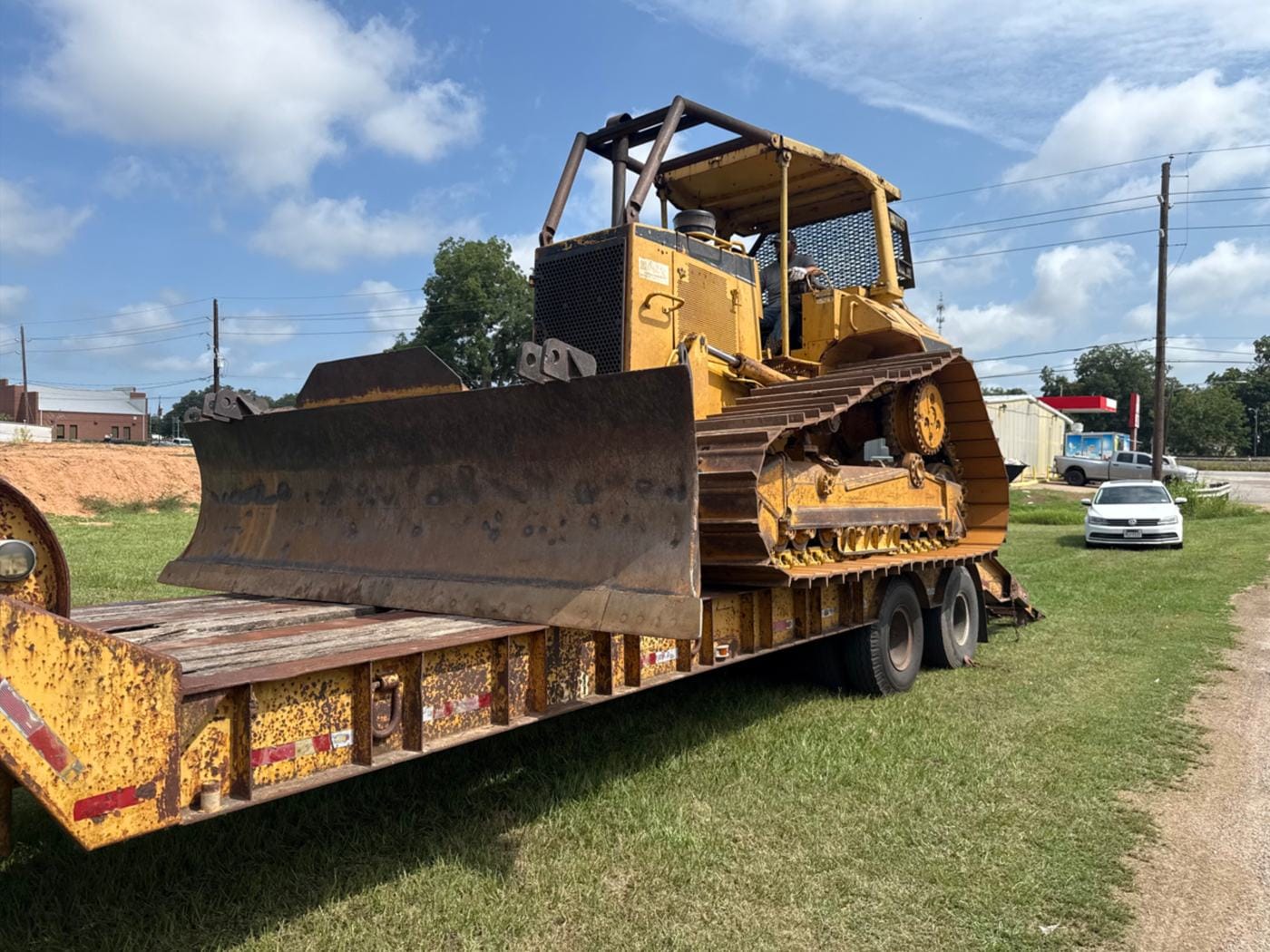 A dozer loaded on a lowboy trailer.